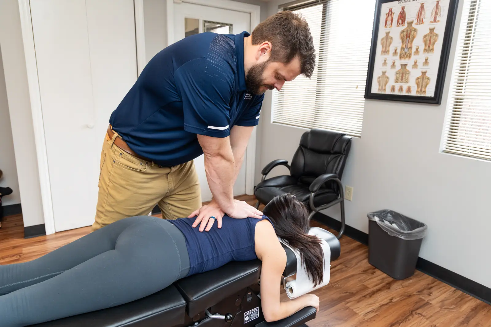 Dr. Kyle Pelphrey performing a chiropractic adjustment on a patient at Pelphrey Chiropractic in Lexington, KY